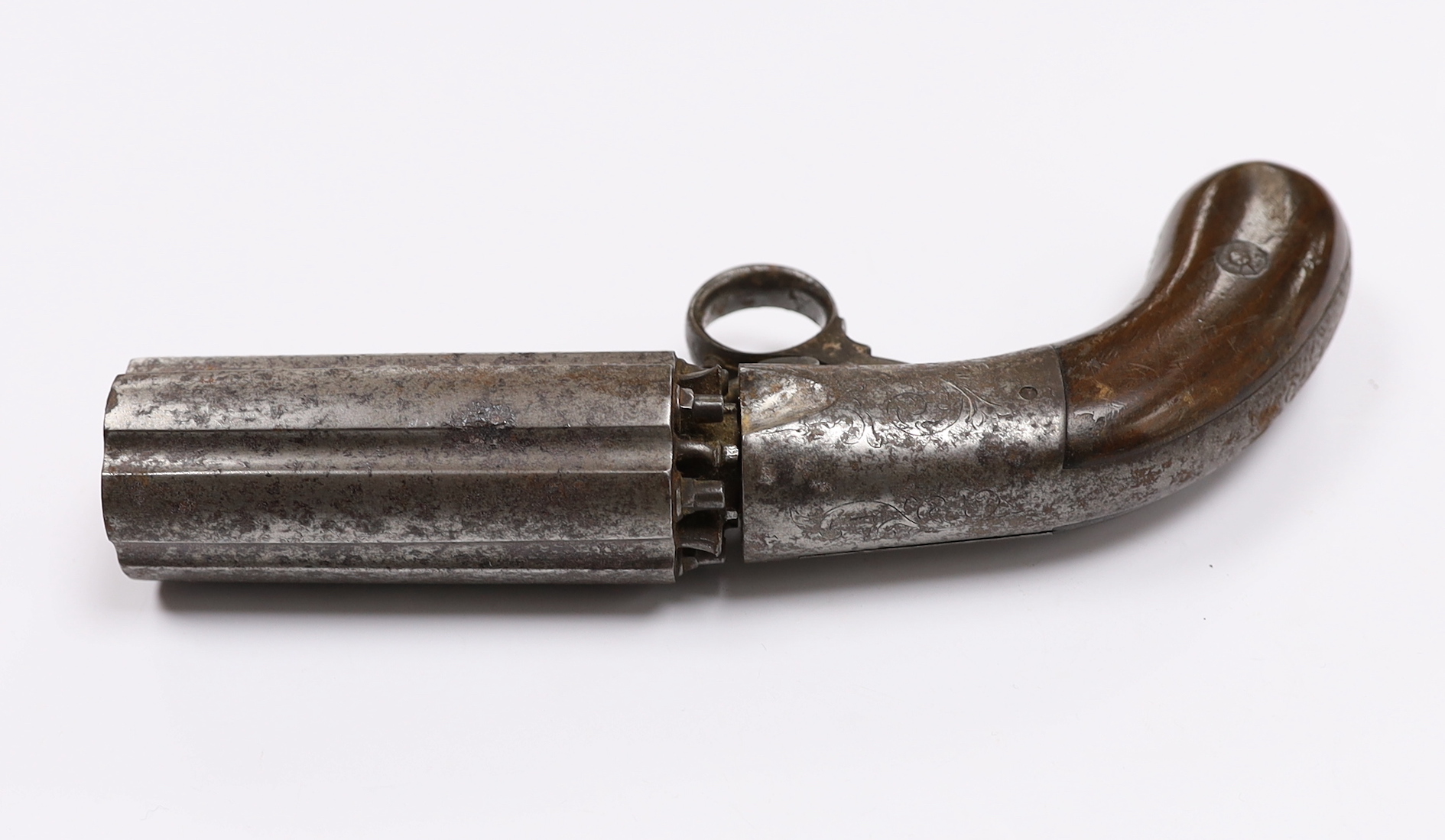 A 19th century, six barrel under action percussion pistol, with engraved lock and walnut grip, stamped ‘Coopers patent’, barrel 8.6cm